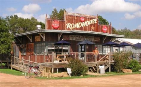 Roadhouse bastrop - Quarter pound all Black Angus Beef hot dog served on a hoagie roll, topped with grilled onions, sweet dill relish, tomato slices, a pickle spear and a side of banana peppers. $7.95. 